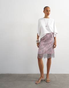 Model wearing Lace midi skirt with pink insert in grey