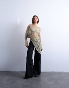 Model wearing Lace off shoulder tunic long sleeve top in green