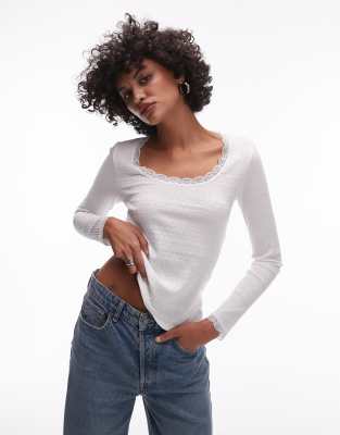 lace pointelle long sleeve top in white