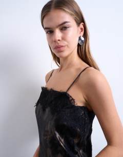 Model wearing Lace slip midi in metallic abstract print