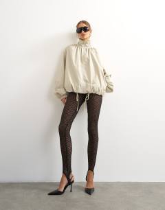 Lace stirrup leggings in black