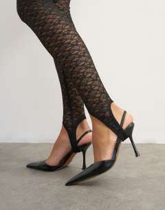 Model wearing Lace stirrup leggings in black