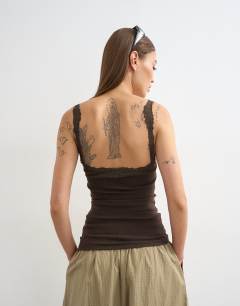 Model wearing Lace trim cami in dark chocolate