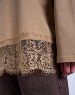 Model wearing Lace trim oversized skater in stone