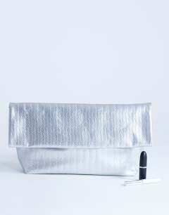 Model wearing Lara weave oversized clutch bag in silver