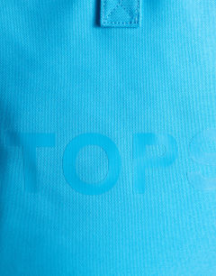 Model wearing Large canvas tote bag in turquoise 
