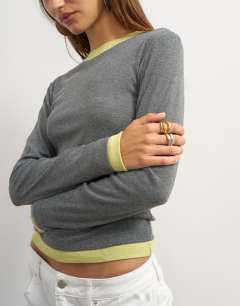 Model wearing Layered long sleeve fitted tee in grey and green