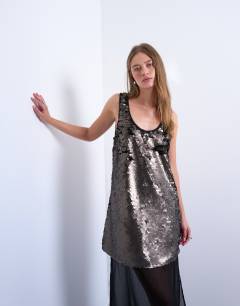 Model wearing Layered sheer sequin midi dress in pewter