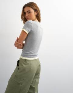 Model wearing Layered short sleeve fitted tee in grey & yellow