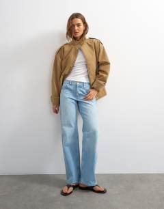 Model wearing Layered short sleeve fitted tee in white