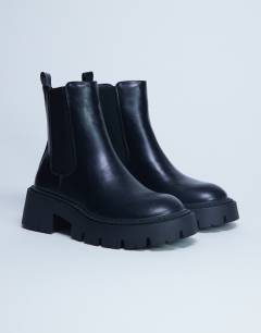 Model wearing Layla chunky chelsea boots in black