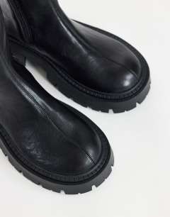 Model wearing Leah chunky over the knee boot in black