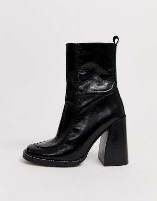 black leather heeled ankle boots