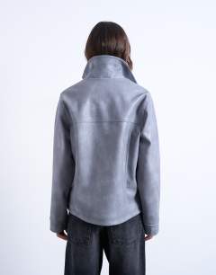 Model wearing Leather look CF zip jacket in washed grey