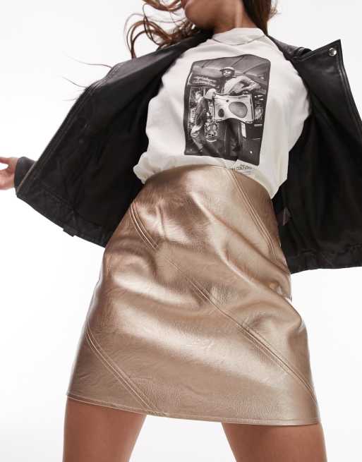 Topshop leather look diagonal seam mini skirt in gold | ASOS