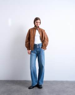 Model wearing Leather look funnel neck jacket in washed brown