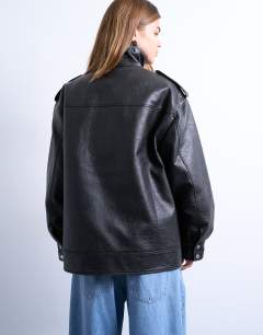 Model wearing Leather look oversized funnel neck zip through jacket in black