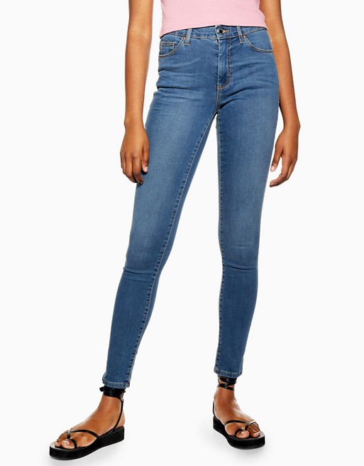 Topshop leigh jeans in mid wash blue | ASOS