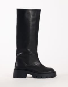 Model wearing Lennox chunky knee high boot in black