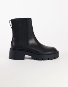 Model wearing Leon chunky chelsea ankle boot in black
