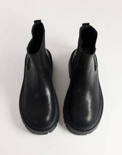 Model wearing Leon chunky chelsea ankle boot in black