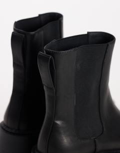 Model wearing Leon chunky chelsea ankle boot in black