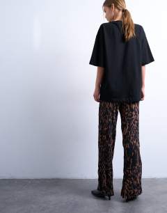 Model wearing Leopard print crinkle wide leg trouser in brown