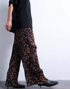 Model wearing Leopard print crinkle wide leg trouser in brown