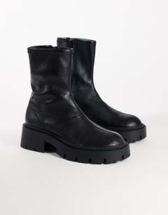Model wearing Liam chunky sock boot in black