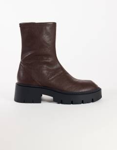 Model wearing Liam chunky sock boot in chocolate