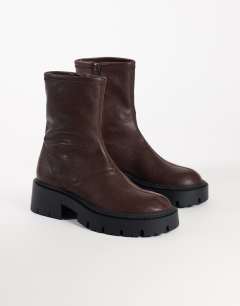 Model wearing Liam chunky sock boot in chocolate