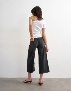 Model wearing Light weight wide crop jean in washed black