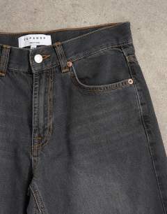 Model wearing Light weight wide crop jean in washed black