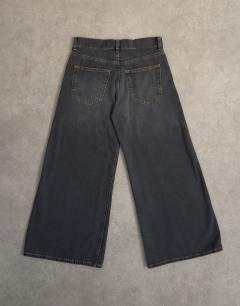 Model wearing Light weight wide crop jean in washed black