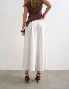 Model wearing Linen A line culotte in white