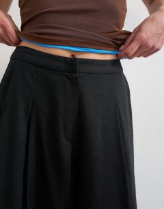 Model wearing Linen A line wide leg trouser in black