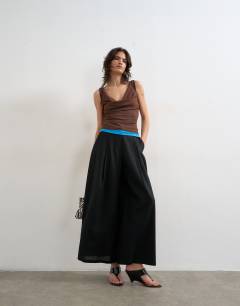 Model wearing Linen A line wide leg trouser in black