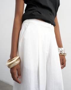 Model wearing Linen A line wide leg trouser in white