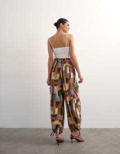 Model wearing Linen abstract print cargo in brown