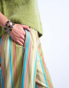 Model wearing Linen balloon trouser in multi stripe