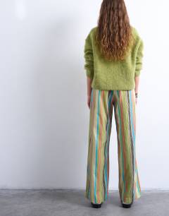Model wearing Linen balloon trouser in multi stripe