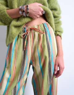 Model wearing Linen balloon trouser in multi stripe