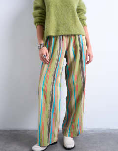 Model wearing Linen balloon trouser in multi stripe
