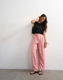 Model wearing Linen balloon trouser with tie waist in light pink