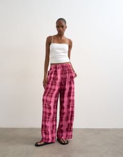 Model wearing Linen balloon trouser with tie waist in pink check