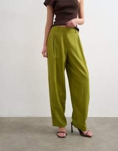 Model wearing Linen barrel leg trouser in green