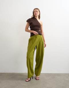Model wearing Linen barrel leg trouser in green