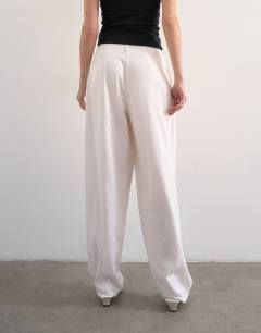 Model wearing Linen barrel leg trouser in white
