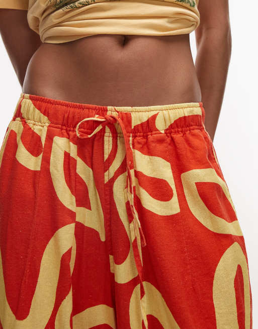 Topshop linen blend balloon pants in bright orange abstract floral print