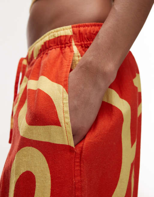 Topshop linen blend balloon pants in bright orange abstract floral print